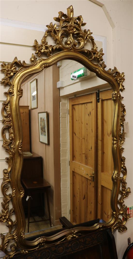 A gilt rococco framed wall mirror W.90cm